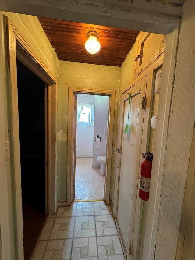 hallway featuring wood ceiling