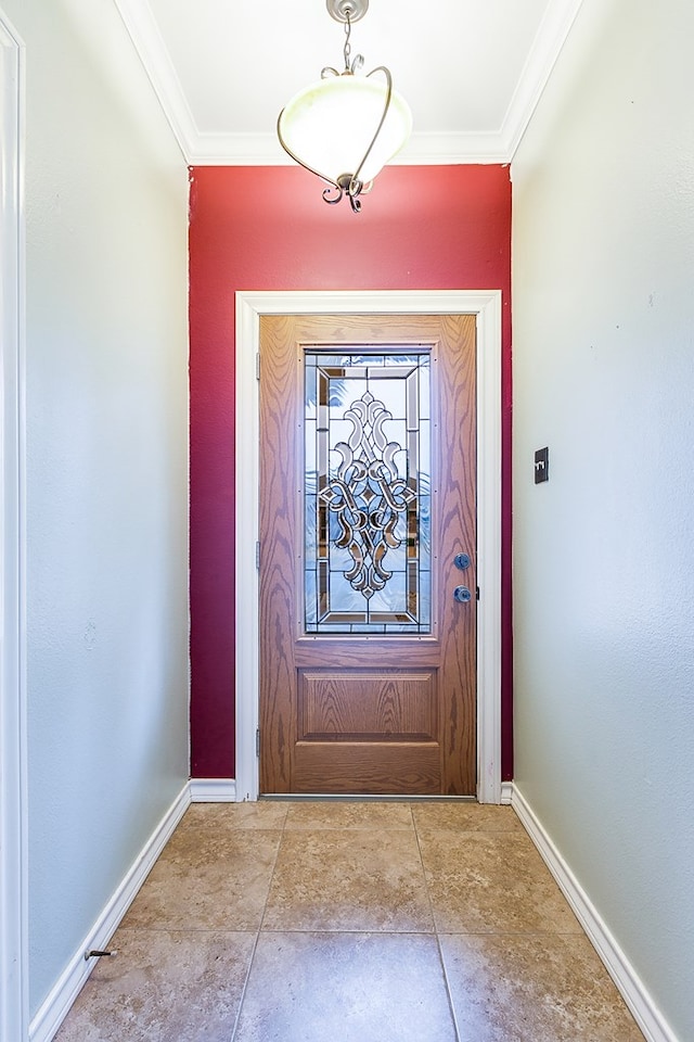 doorway to outside featuring crown molding