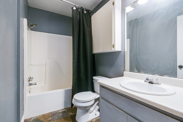 3101 Grove Dr, San Angelo, TX 76903 - bathroom with stone finish flooring, shower / tub combo with curtain, and vanity
