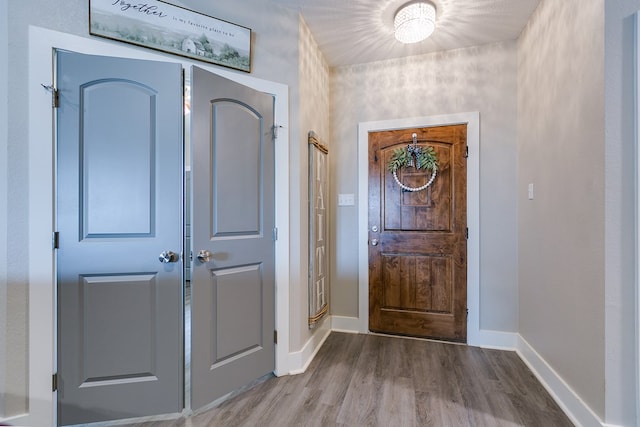 3406 Twin Mountain Dr, San Angelo, TX 76904 - entrance foyer with wood finished floors and baseboards
