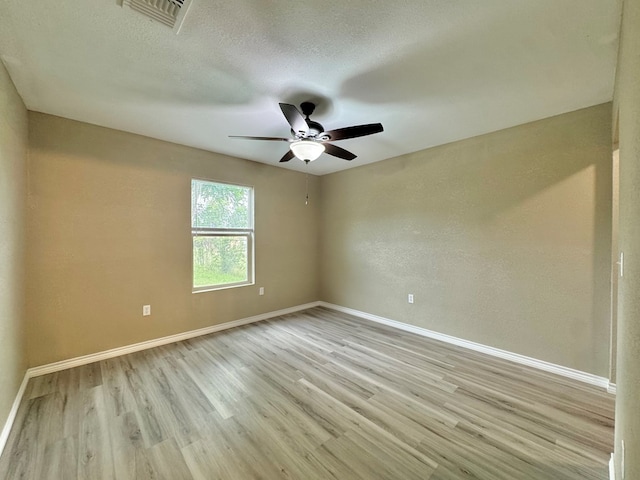919 E 20th St, San Angelo, TX 76903 - empty room featuring baseboards, light wood-type flooring, and a ceiling fan