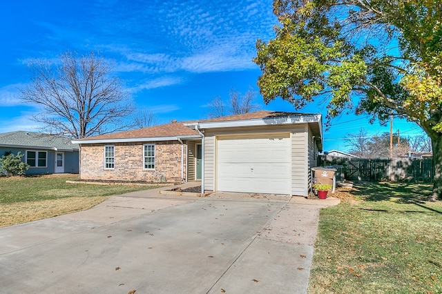 ranch-style house featuring a garage and a front yard