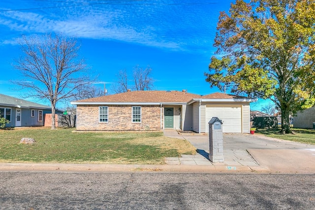 ranch-style home with a garage and a front lawn