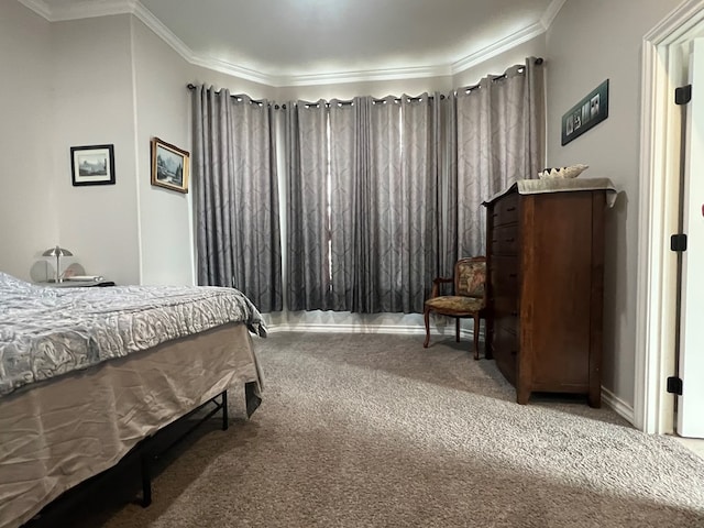 bedroom featuring crown molding and carpet floors