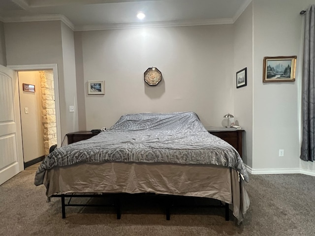 bedroom featuring crown molding and carpet floors