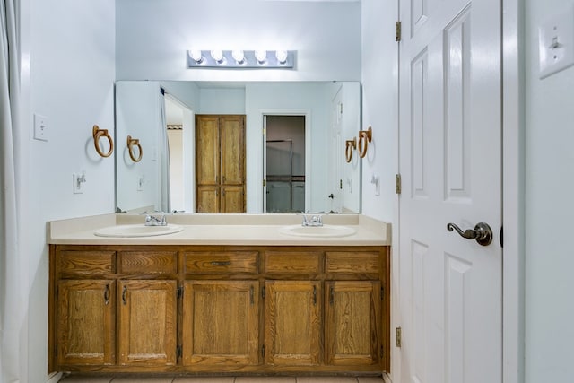 261 Edinburgh Rd, San Angelo, TX 76901 - full bathroom with double vanity and a sink