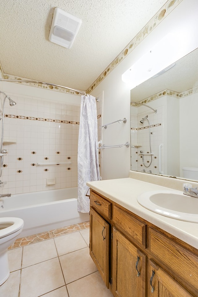 261 Edinburgh Rd, San Angelo, TX 76901 - full bathroom with tile patterned flooring, shower / bathtub combination with curtain, toilet, a textured ceiling, and visible vents