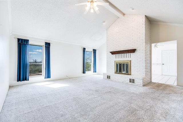 261 Edinburgh Rd, San Angelo, TX 76901 - unfurnished living room with beamed ceiling, visible vents, carpet floors, and a ceiling fan