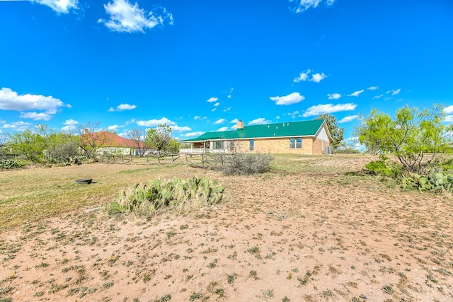 261 Edinburgh Rd, San Angelo, TX 76901 - exterior space featuring fence and metal roof