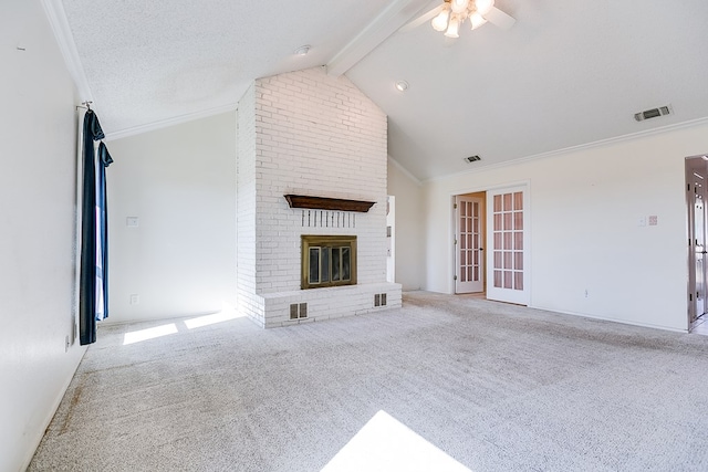 261 Edinburgh Rd, San Angelo, TX 76901 - unfurnished living room with carpet floors, ceiling fan, ornamental molding, and beam ceiling
