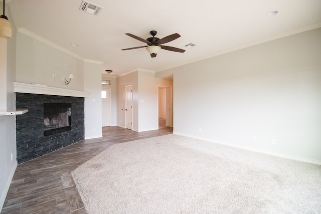 5806 Willeke Dr, San Angelo, TX 76904 - unfurnished living room featuring ceiling fan, baseboards, a fireplace, crown molding, and dark wood finished floors