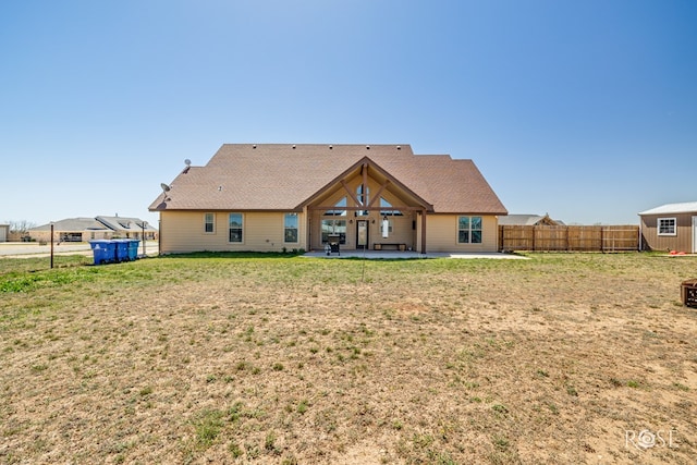 3504 Badger Ct, San Angelo, TX 76901 - rear view of property featuring a patio area and an outdoor structure