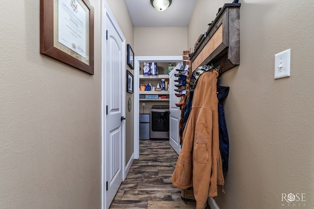 3504 Badger Ct, San Angelo, TX 76901 - hallway with washer / dryer, wood finished floors, and a textured wall