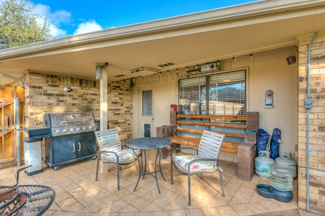 view of patio with a grill