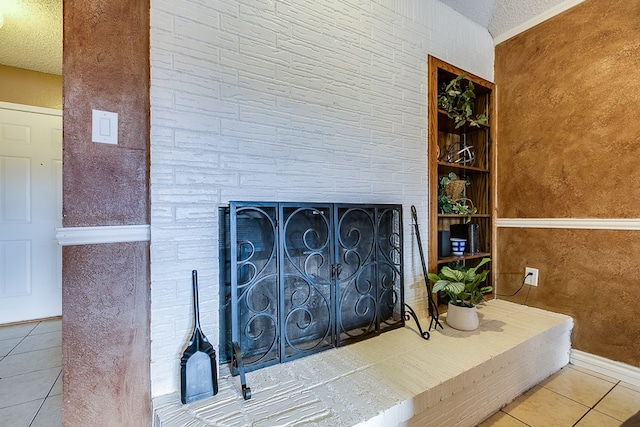 interior details featuring a stone fireplace