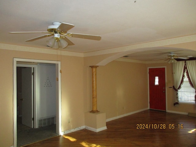 entryway with ceiling fan, ornamental molding, and hardwood / wood-style floors