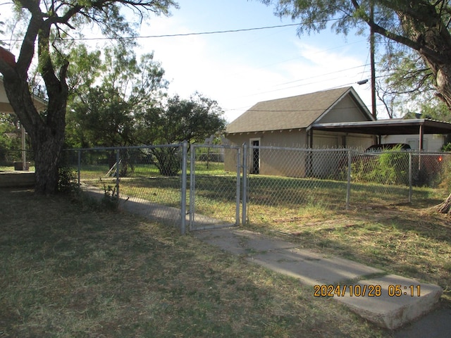 view of yard with a carport