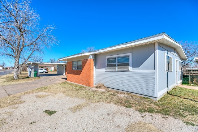 view of front of home with a carport