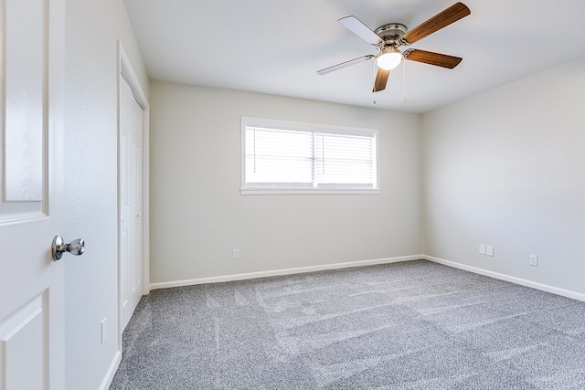 unfurnished bedroom featuring a closet, ceiling fan, and carpet