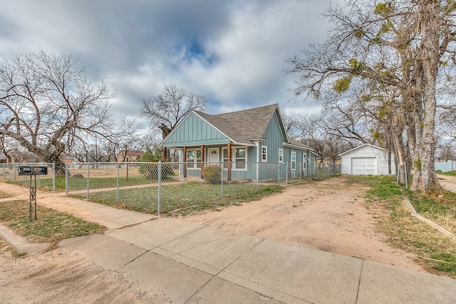 view of front of home featuring an outbuilding and a garage