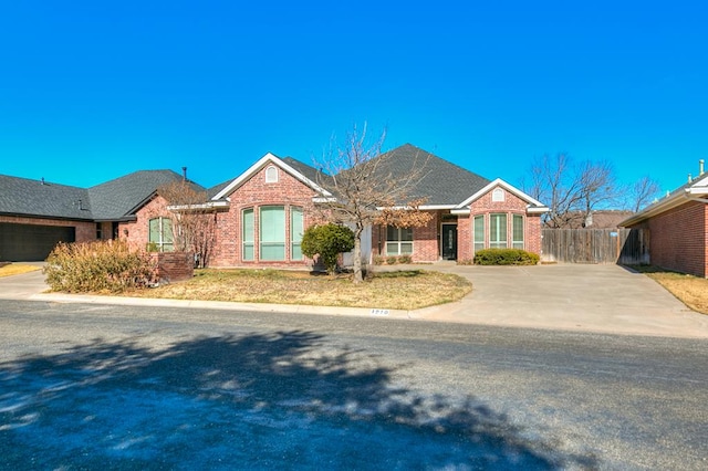 single story home with a garage