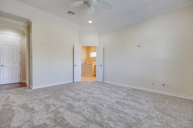 unfurnished bedroom featuring ceiling fan, ornamental molding, and light carpet