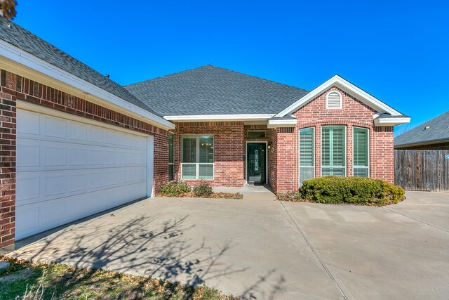 view of front property with a garage