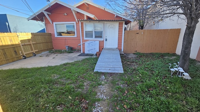 rear view of property with a patio area