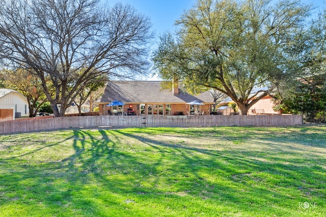 view of yard with fence