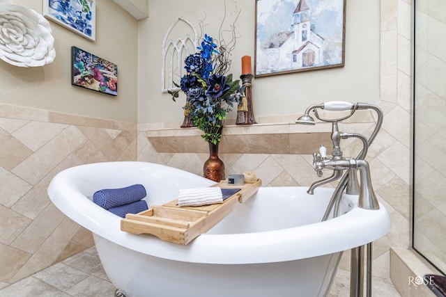 full bathroom featuring a soaking tub