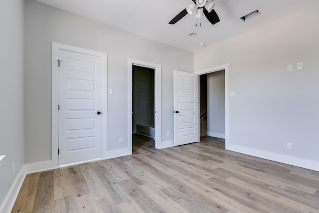 unfurnished bedroom with light hardwood / wood-style floors and ceiling fan