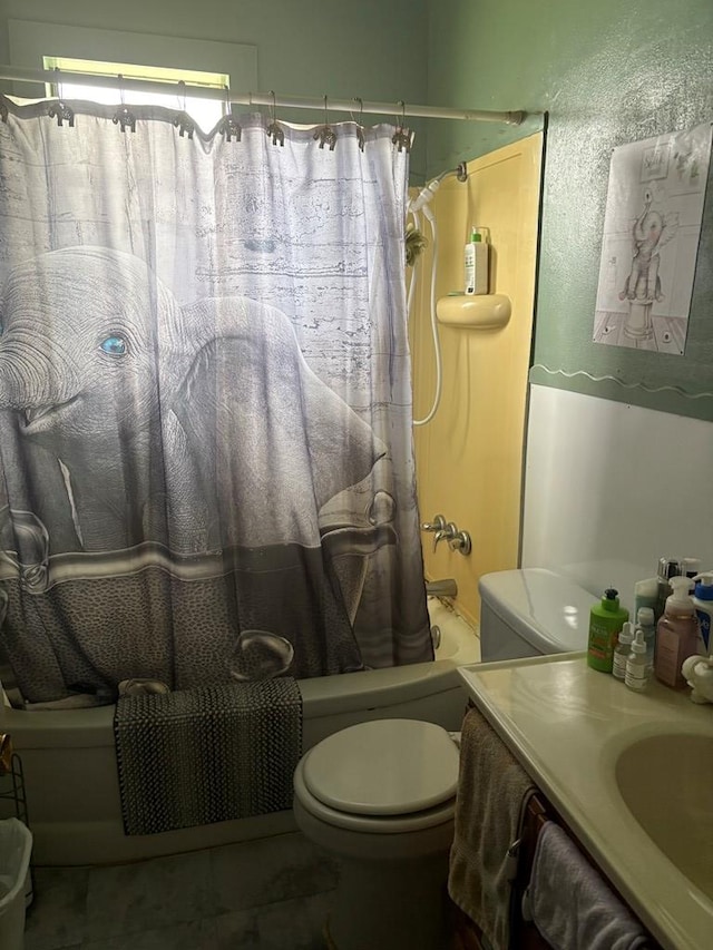 811 Akin St, San Angelo, TX 76901 - bathroom with toilet, shower / bath combination with curtain, and vanity