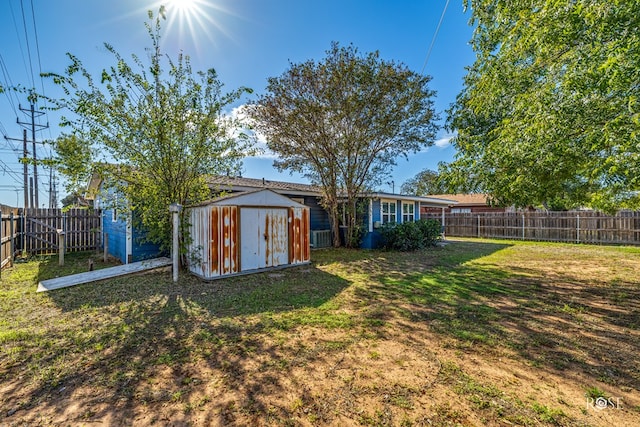 view of yard with a storage shed