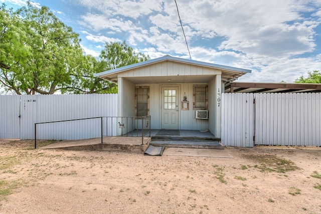 exterior space with fence and a gate