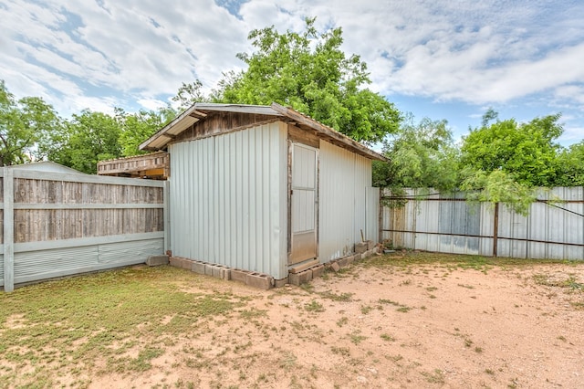 view of shed with a fenced backyard
