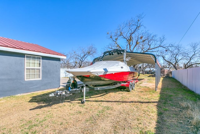 view of yard featuring a carport