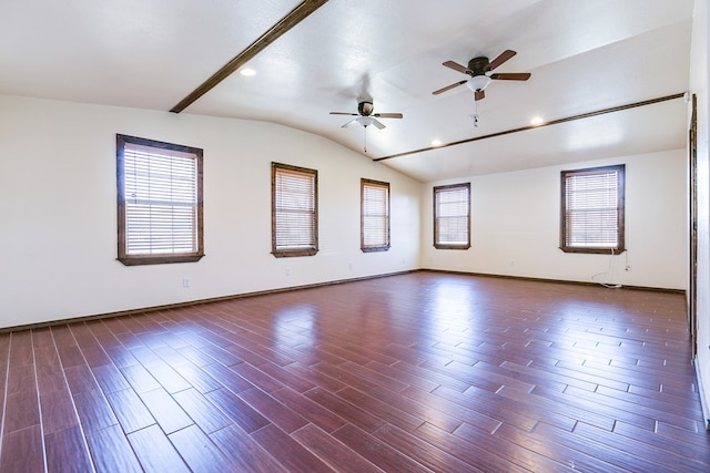 spare room with lofted ceiling, hardwood / wood-style floors, and ceiling fan