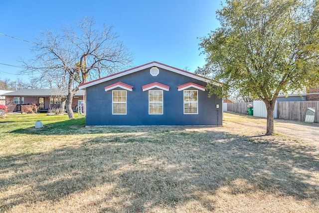 view of home's exterior featuring a yard