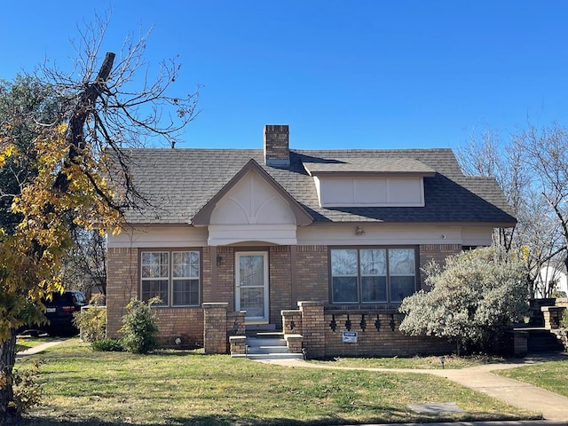 view of front of house with a front yard