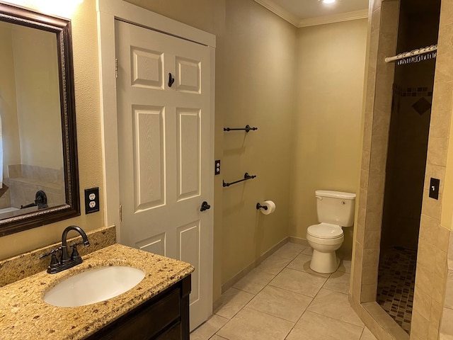 bathroom with walk in shower, toilet, ornamental molding, vanity, and tile patterned flooring