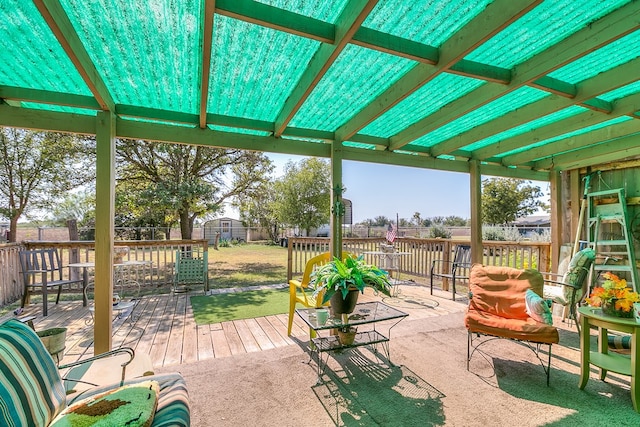 1027 Butterfly Ln, San Angelo, TX 76905 - deck featuring a storage shed and an outdoor structure