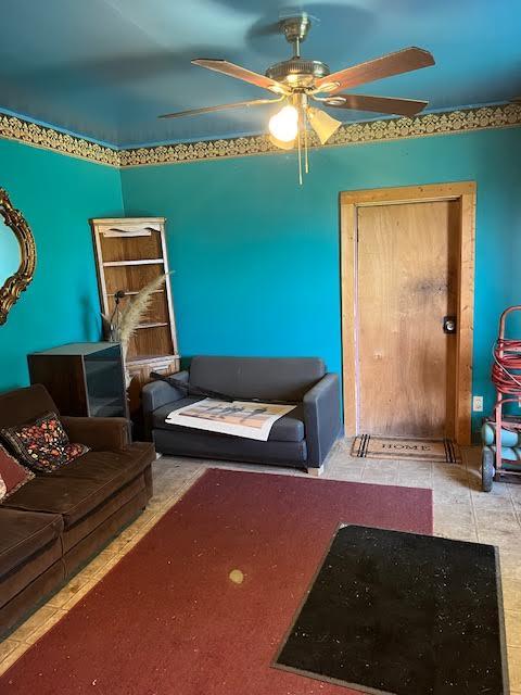 8523 Runion Rd, San Angelo, TX 76905 - living room with ceiling fan