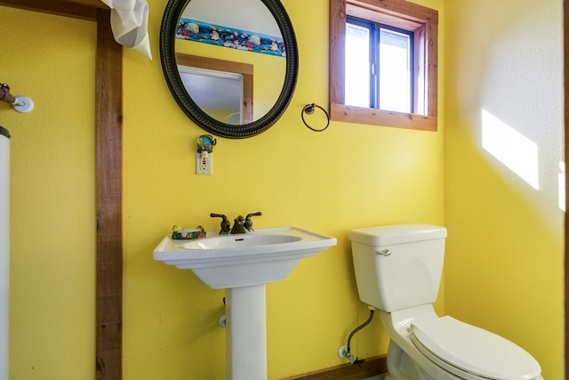 bathroom with sink and toilet