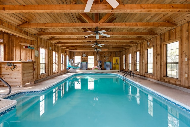 view of swimming pool featuring ceiling fan