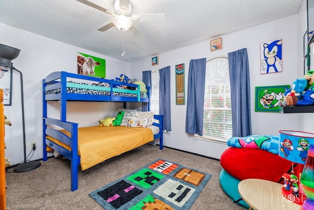 bedroom with carpet flooring, multiple windows, and a textured ceiling