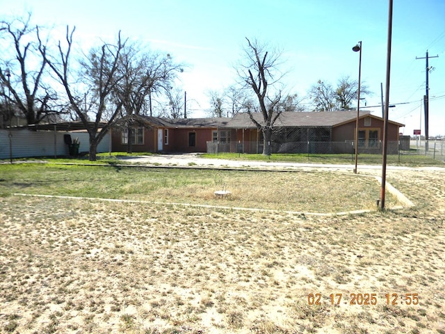 exterior space with a front lawn