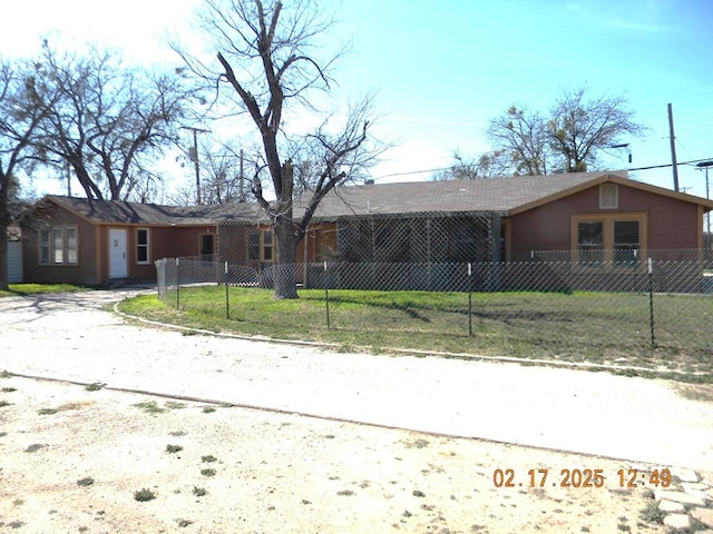 ranch-style house with a front yard