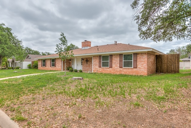 3305 Sierra Ct, San Angelo, TX 76904 - single story home with a chimney and brick siding