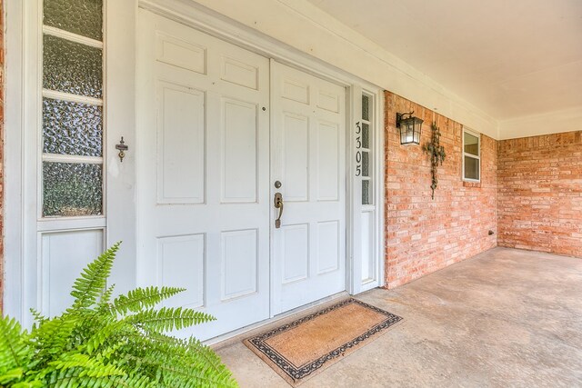 3305 Sierra Ct, San Angelo, TX 76904 - property entrance featuring brick siding and covered porch