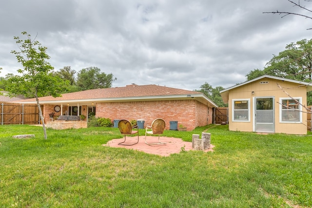 3305 Sierra Ct, San Angelo, TX 76904 - rear view of house featuring a patio and brick siding